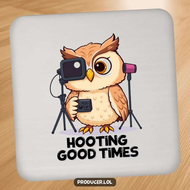 Funny drink coaster showcasing a giggling owl wearing headphones, intently reviewing video footage on a studio monitor.
