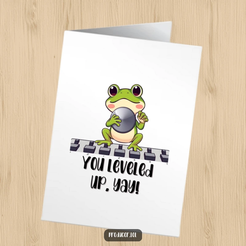 Funny Free Printable congratulations card with a joyful frog pushing a fader knob all the way up, celebrating peak success.