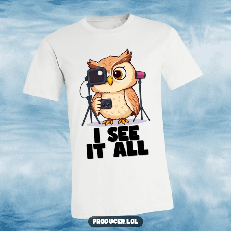 Funny t-shirt depicting a wise, giggling owl watching and analyzing video footage displayed on a professional studio screen.