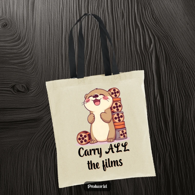 Funny tote bag featuring a playful otter laughing while stacking a high tower of film reels, a humorous and practical accessory.